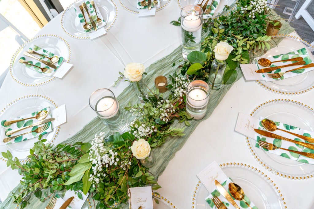 Emerald green and gold tablescape design for a luxury 50th birthday brunch in Atlanta